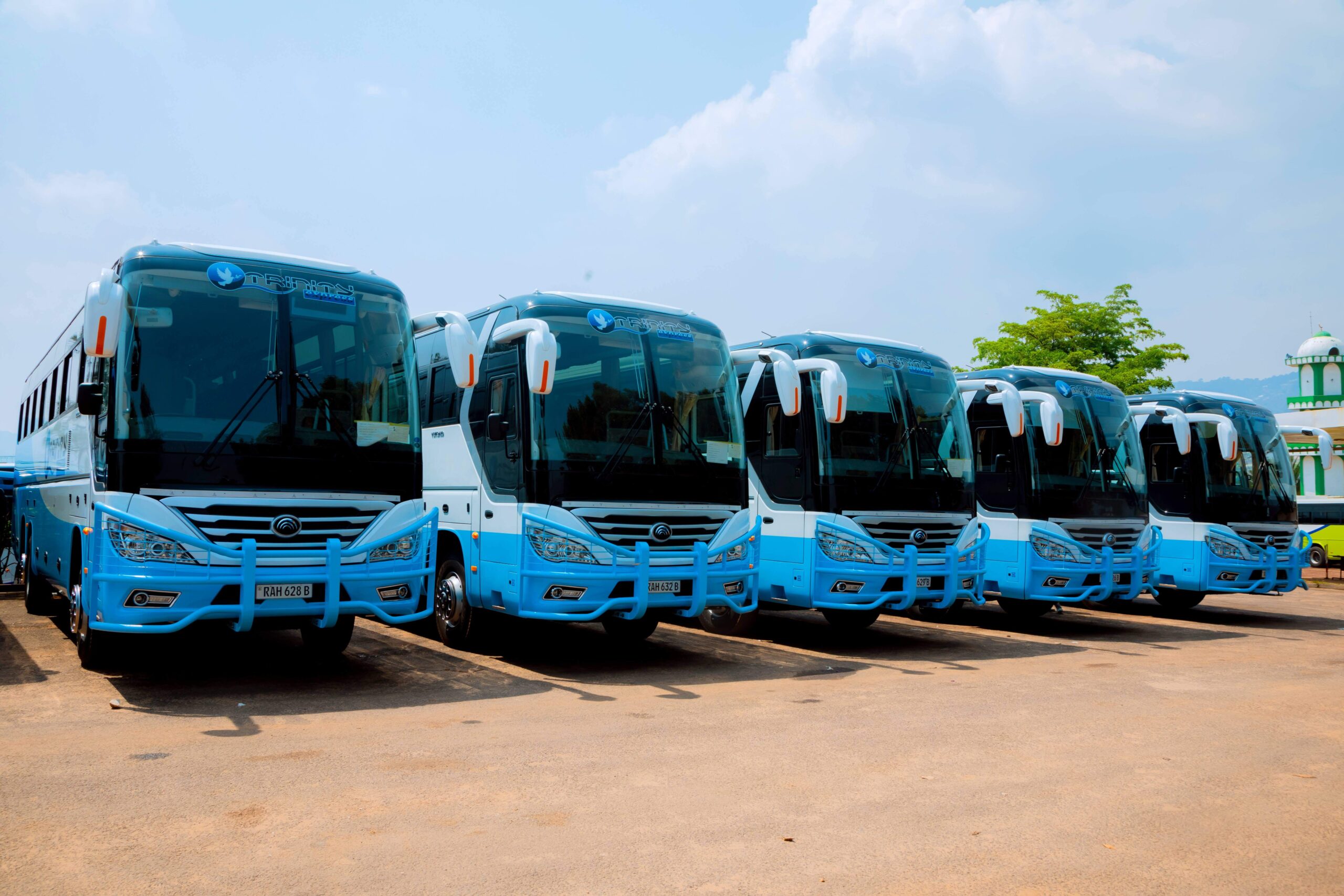 Trinity Express blue buses ready for journeys across East Africa